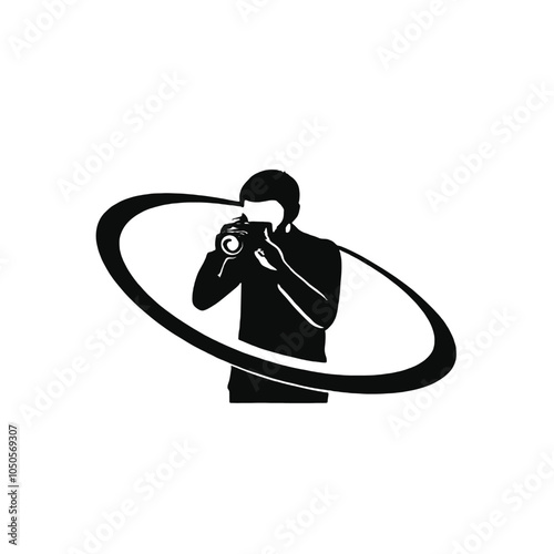 A black silhouette of a young man with short dark hair wearing a camera and taking a photo,