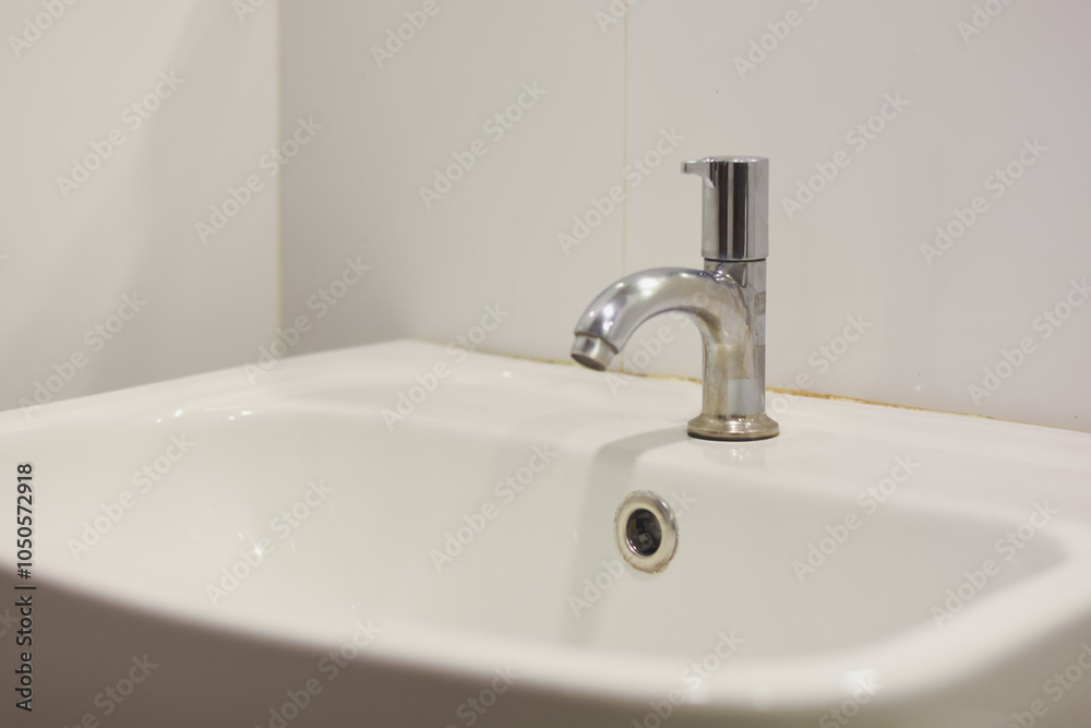 Stainless steel faucet in the bathroom Stainless steel faucet in the bathroom