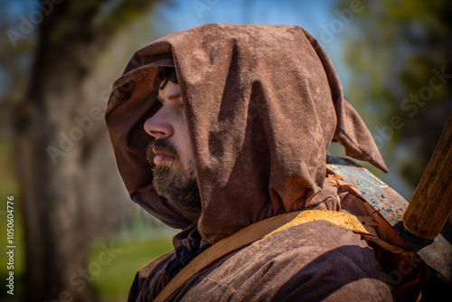 Channeling ancient wisdom and wielding a broadsword, a modern druid steps into the past at the Renaissance fair. photo