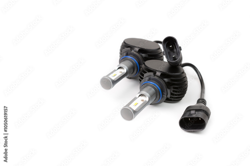 Light bulbs for car lamps. Automotive part in Silvery metallic and black color with wires and connecting elements Light bulbs for car lamps. Automotive part in Silvery metallic and black color with wires and connecting elements