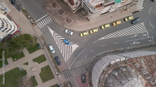 Busy Cross Road and Taxi Parking Top Down Aerial Rotate