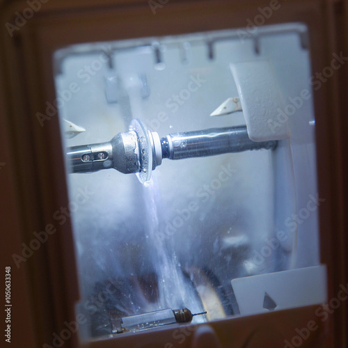 close up of spectacle lenses sharpening