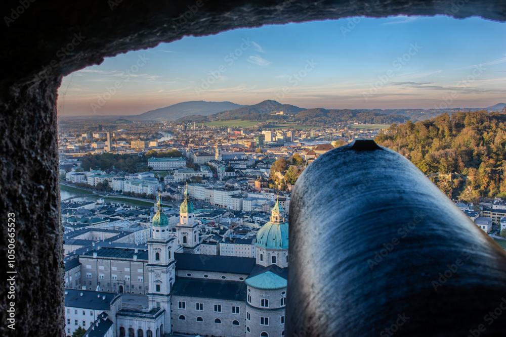 Naklejka premium Cannon View of Salzburg City from Fortress Window