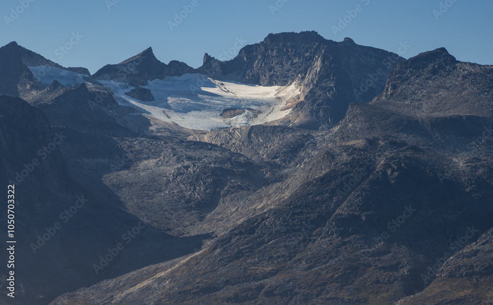 View of icebergs and mountains in the fjords of south Greenland View of icebergs and mountains in the fjords of south Greenland