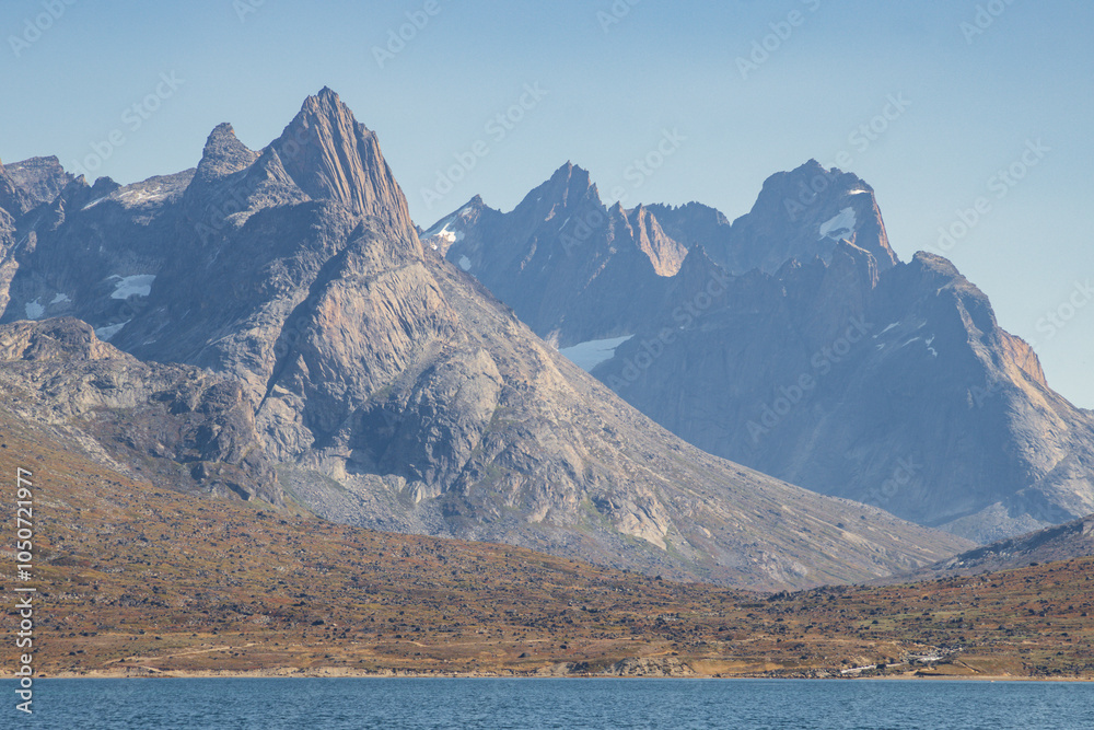 View of icebergs and mountains in the fjords of south Greenland View of icebergs and mountains in the fjords of south Greenland