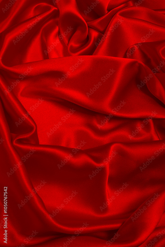 Fototapeta premium Rich and luxury red silk fabric texture background.
