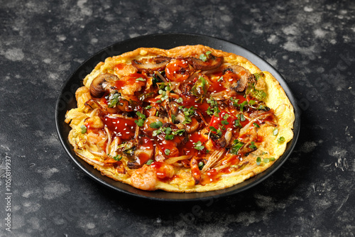 Foo Young Chinese egg omelette filled with vegetables, mushrooms, shrimp and sauce