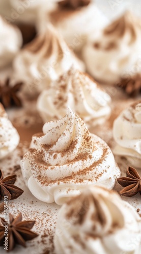 Delicious swirls of cream topped with spices on a dessert table at a cozy gat...