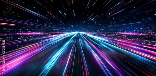 Vibrant light trails create a sense of motion in a nighttime urban landscape ...
