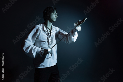 Canvas Print A dramatic hero with a sword in his hands, suffering from defeat and injury, a p