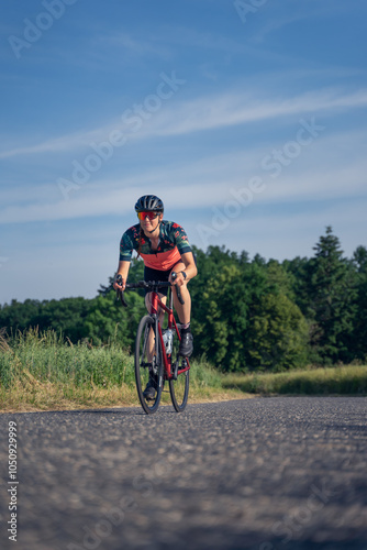 Woman riding on bicycle in park photo