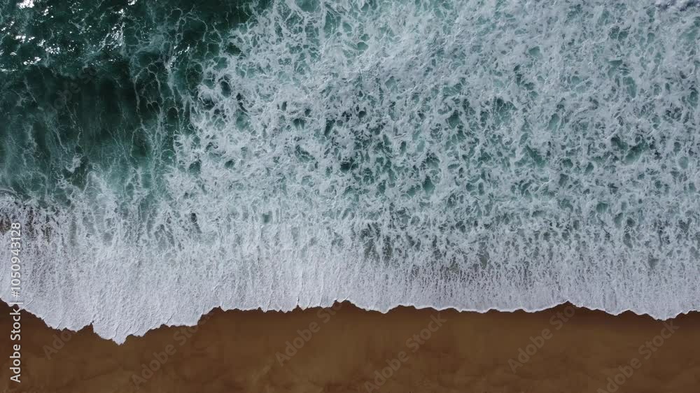 Aerial View of Nazaré North Beach with Waves and Sand, Portugal - Perfect Background for Logo or Text Overlay Aerial View of Nazaré North Beach with Waves and Sand, Portugal - Perfect Background for Logo or Text Overlay