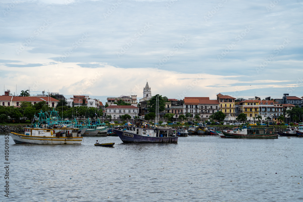 View towards Casco Viejo from the water, with fishing boats in front of old buildings View towards Casco Viejo from the water, with fishing boats in front of old buildings