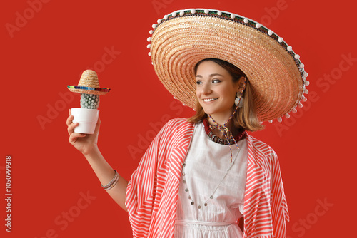 Pretty young woman in sombr...