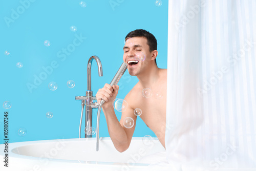 Young man singing with show...