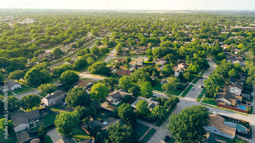 Master planned community with green zero emission urban design neighborhood in Coppell Texas Dallas Fort Worth metroplex, row of upscale single-family houses swimming pool, large backyard, aerial