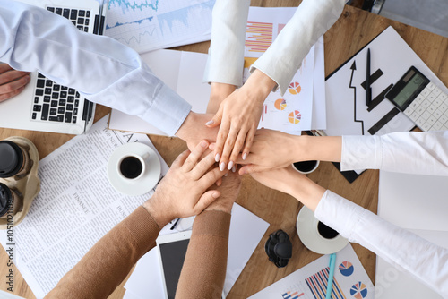 Business people putting han...