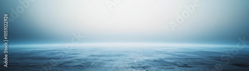 Abstract empty space with soft blue lighting and fog, eerie and atmospheric environment