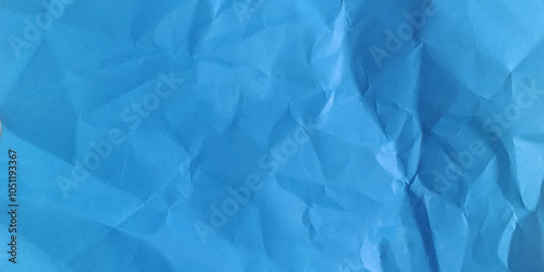 Top view of blue wrinkled or crumpled paper texture used as crumpled paper background texture in decorative art work stock photo