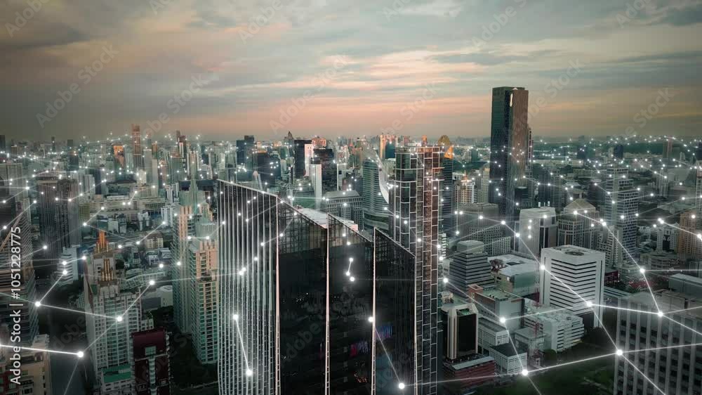 Aerial skyline at sunset modern smart digital city with animation of computer data web connection