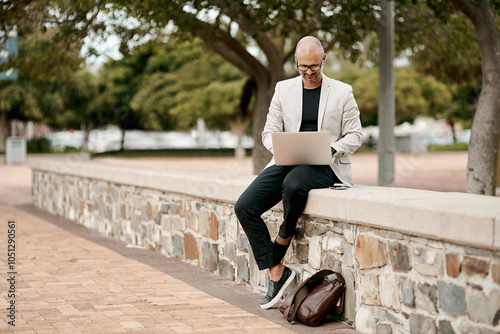 Business man, laptop and research outdoor for project management, networking and communication with bag. Mature employee, technology and online in park for property development, real estate and email