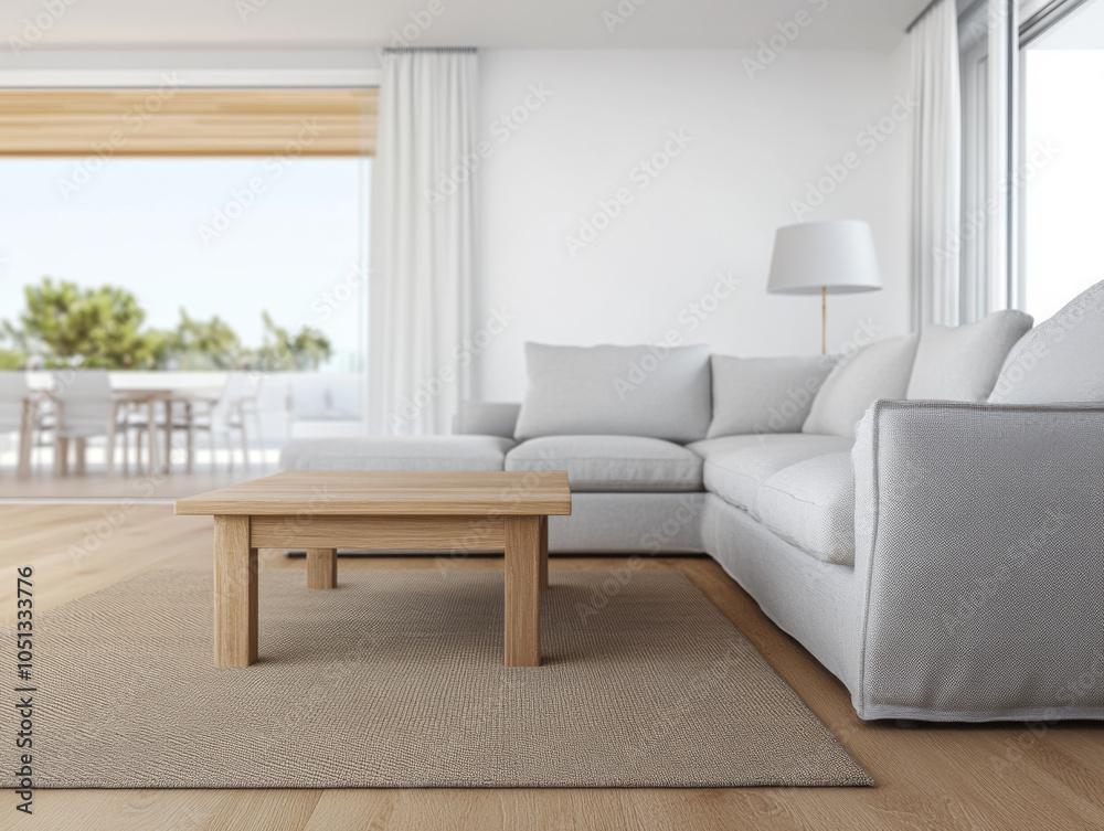 Fototapeta premium Modern living room interior with light-colored sofa and wooden coffee table in sunny space