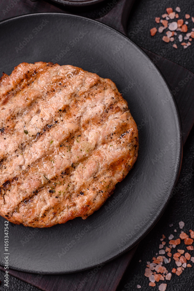 Juicy grilled beef or pork steak with salt, spices and herbs Juicy grilled beef or pork steak with salt, spices and herbs
