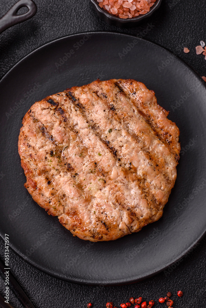 Juicy grilled beef or pork steak with salt, spices and herbs Juicy grilled beef or pork steak with salt, spices and herbs