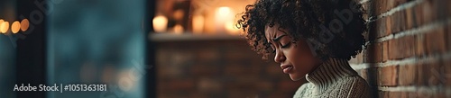 Woman in contemplation, cozy atmosphere with soft lighting, introspective mood.