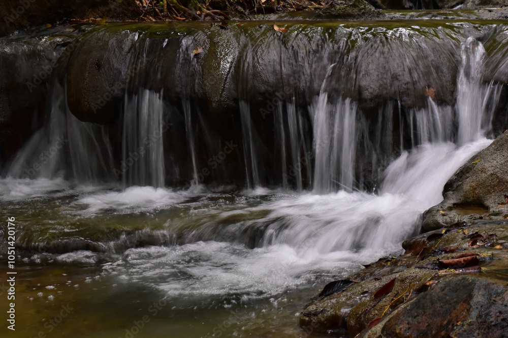 Obraz premium Visit the waterfall for additional refreshment