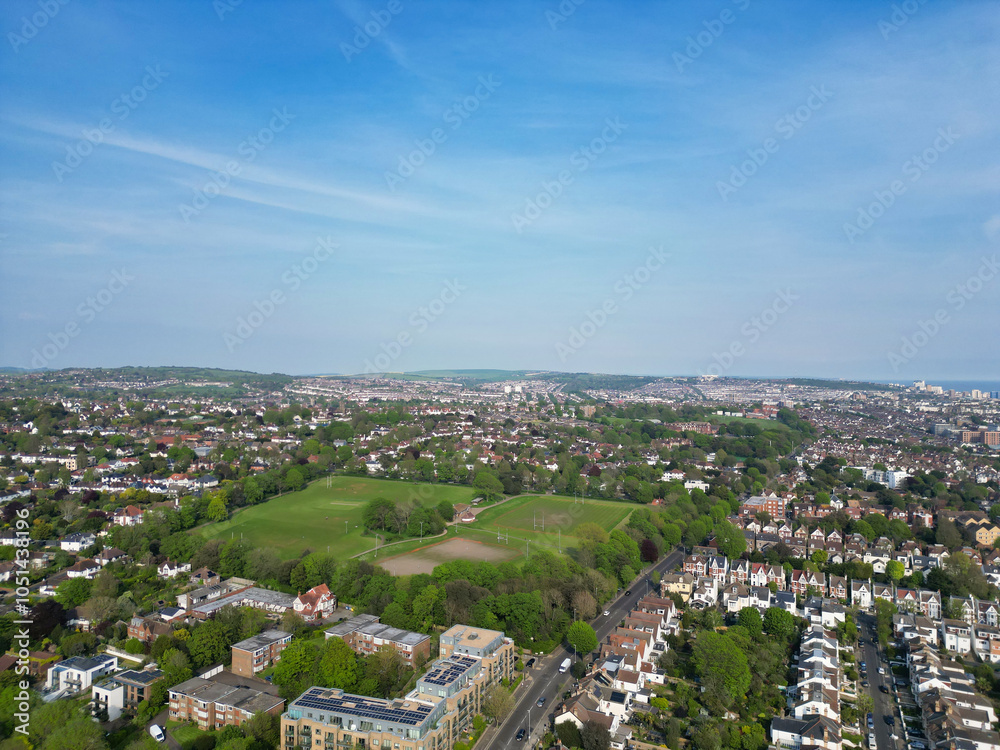 Fototapeta premium High Angle View of Most Beautiful and Attractive British Tourist Attraction of Brighton seaside resort and Beach City of East Sussex, England GB. Footage Captured with Drone's Camera on May 9th, 2024