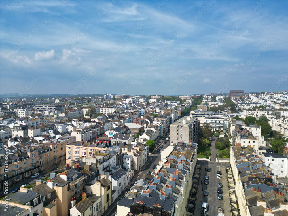 Fototapeta premium High Angle View of Most Beautiful and Attractive British Tourist Attraction of Brighton seaside resort and Beach City of East Sussex, England GB. Footage Captured with Drone's Camera on May 9th, 2024