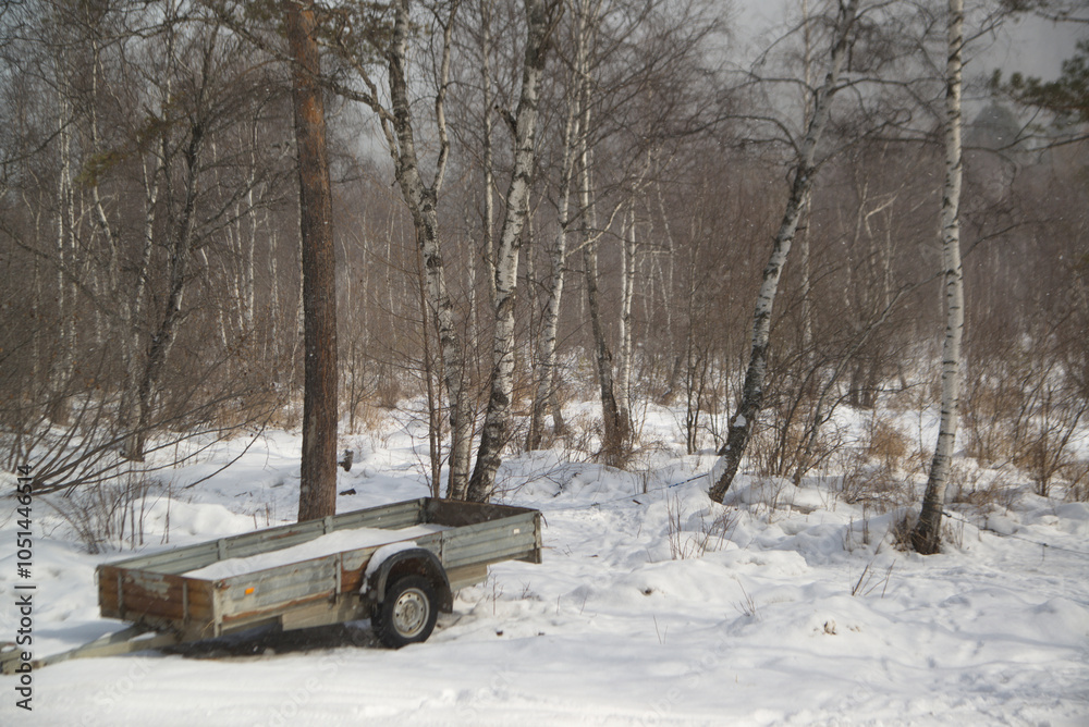 Old trailer in the countryside. Equipment for working in the field. Located at Listvyanka, Irkutsk Oblast, Russia. Old trailer in the countryside. Equipment for working in the field. Located at Listvyanka, Irkutsk Oblast, Russia.