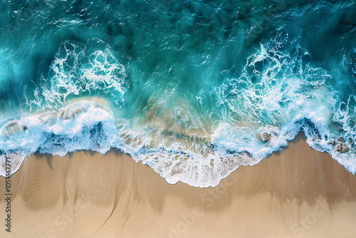 Fototapeta Naklejka Na Ścianę i Meble -  Aerial top view of a beautiful sandy beach with turquoise water and waves, creating a natural background concept. A bird's-eye shot from above, with the style resembling that of a photographer.