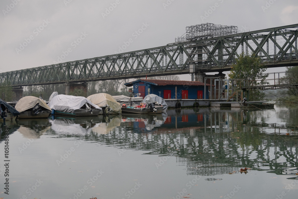 GPS INSIDE Flood River Po Ticino Bridge Becca water banks trees boats harbor panorama nature landscape