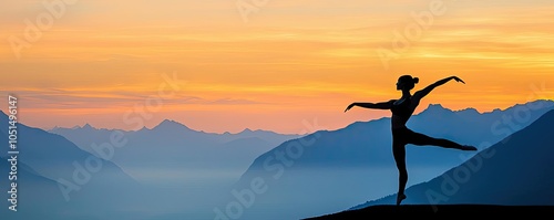 Ballet dancer silhouette against a stunning mountain sunset backdrop