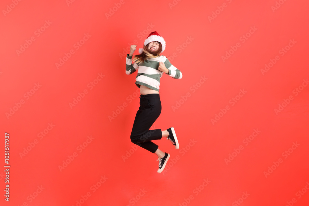 Woman wearing Santa hat Woman wearing Santa hat