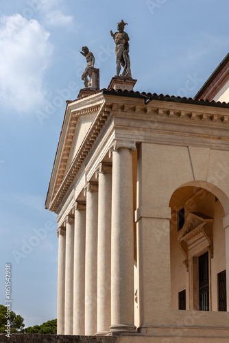 Wallpaper Mural This grand villa showcases Palladian architecture with a stately colonnade, sculpted statues on the roofline, and arched entrances. A serene garden and central well enhance the classical ambiance. Torontodigital.ca