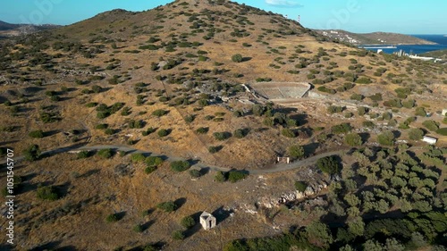 Cinematic drone flight through Greek countryside with Ancient Theatre of Thorikos photo