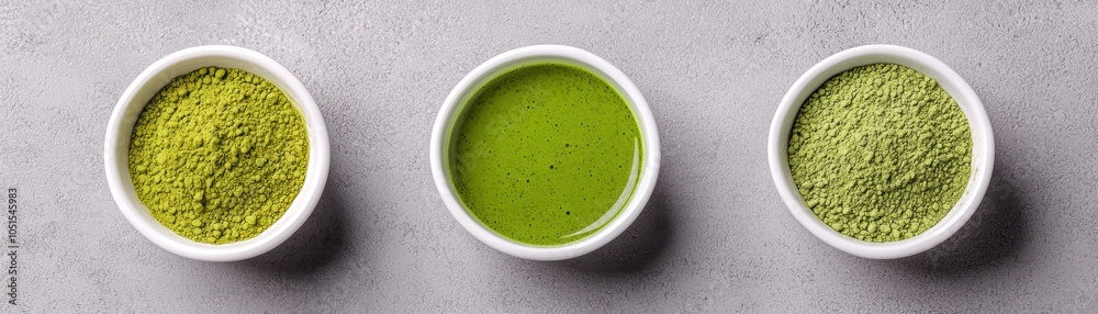 Three bowls of green sauces on a textured surface, showcasing vibrant colors and textures. Three bowls of green sauces on a textured surface, showcasing vibrant colors and textures.