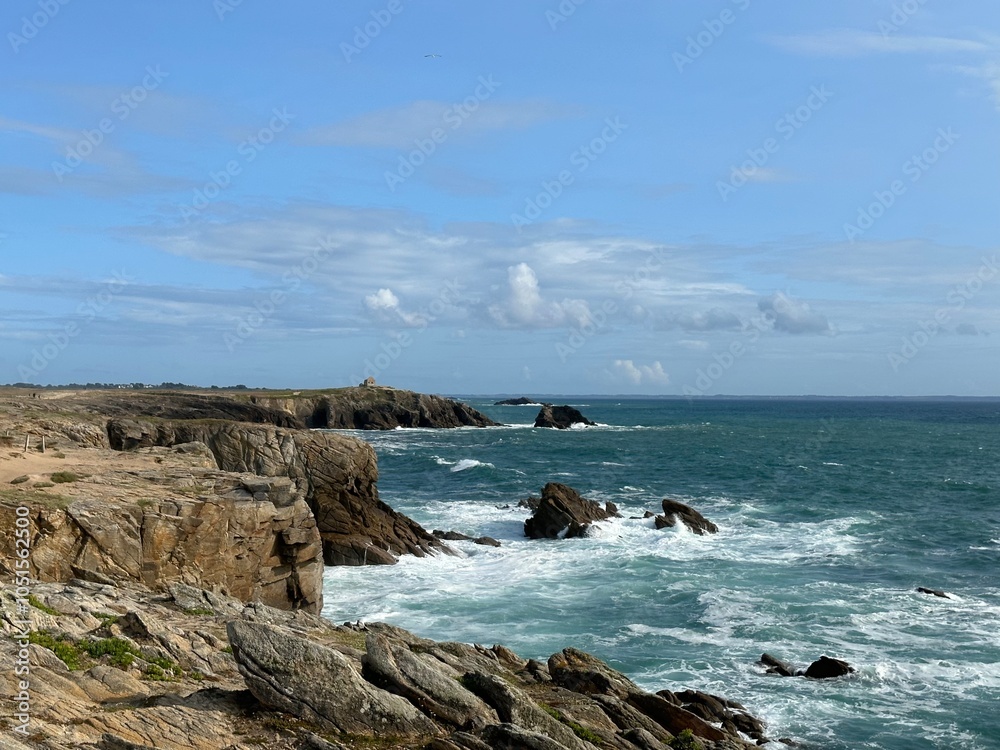 The Atlantic Ocean waves crashing on rocky coast of the Quiberon peninsula, Portivy, Lorient, Brittany, France, July 2023