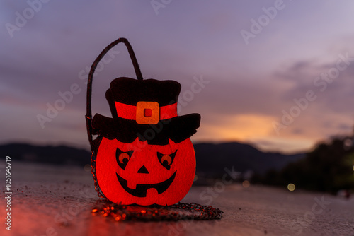 Concept: Halloween beach and ocean background with pumpkins, witches, ghosts, dark, scary tones. photo