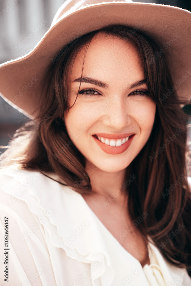 Closeup beauty portrait. Young beautiful smiling hipster woman in trendy summer white blouse and jeans. Carefree woman posing in the street in sunny day. Positive model outdoors. Cheerful and happy Closeup beauty portrait. Young beautiful smiling hipster woman in trendy summer white blouse and jeans. Carefree woman posing in the street in sunny day. Positive model outdoors. Cheerful and happy