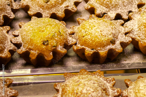 cake, rum baba, French sweet dessert baba with rum. Cake. Yeast pie. Confectionery for children. Bakery products for the food industry. Snack concept. Close-up. photo