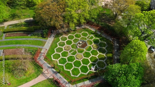 Aerial view of a hexagon green park in a city. photo