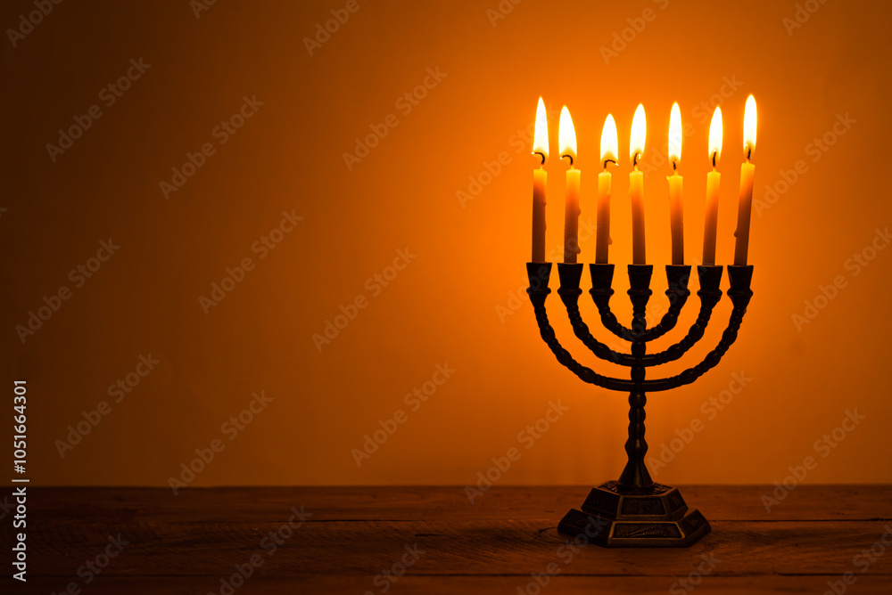 Fototapeta premium Hanukkah Menorah with burning candles