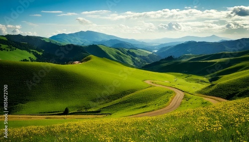 Scenic Winding Road Through Rolling Hills and Mountains