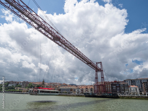 Gondola car moving along the Vizkaya Transporter Bridge over the River Nervion towards Portugalete, Getxo, near Bilbao, Basque Country, Spain, Europe photo