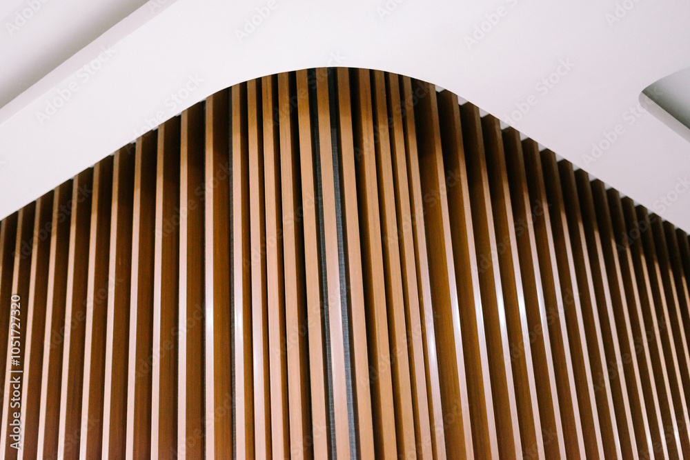 An elegant wall design featuring wooden panels, creating a sophisticated and warm ambiancee An elegant wall design featuring wooden panels, creating a sophisticated and warm ambiancee