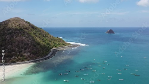 Aerial shot of tropical bay with boats in Lombok, Indonesia photo